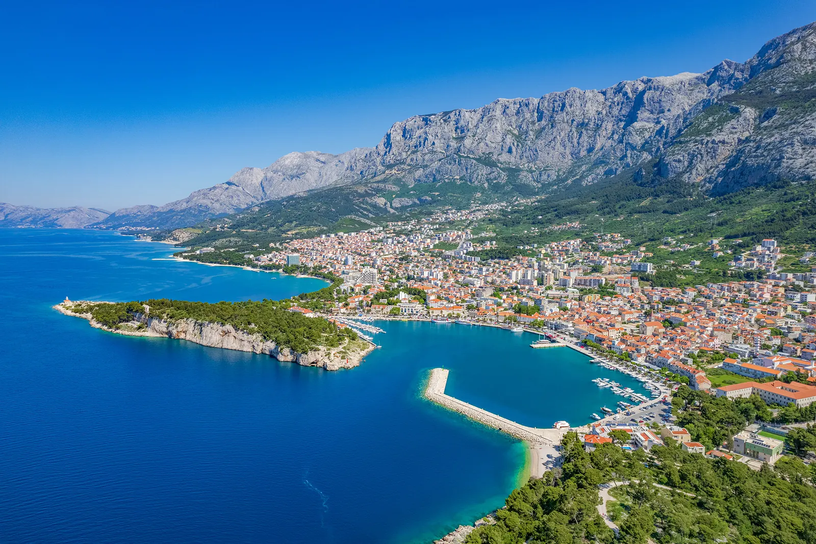 Makarska coastline with Biokovo mountain above the town